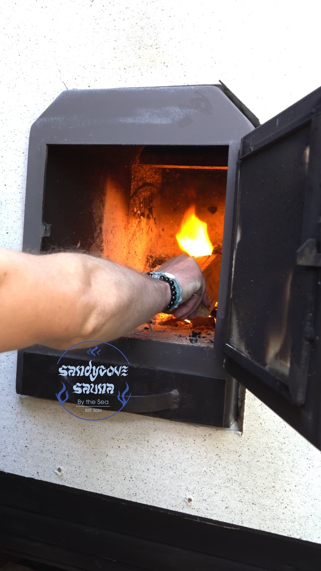 Wood-fired stove at Sandy Cove Sauna
